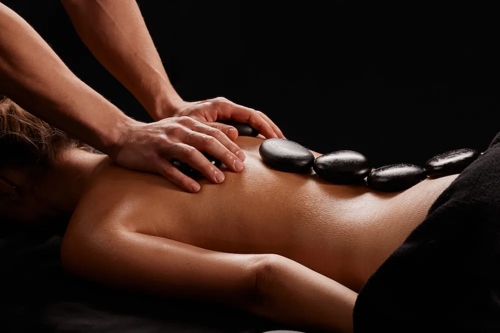 HOT STONE MASSAGE HOT STONE MASSAGE